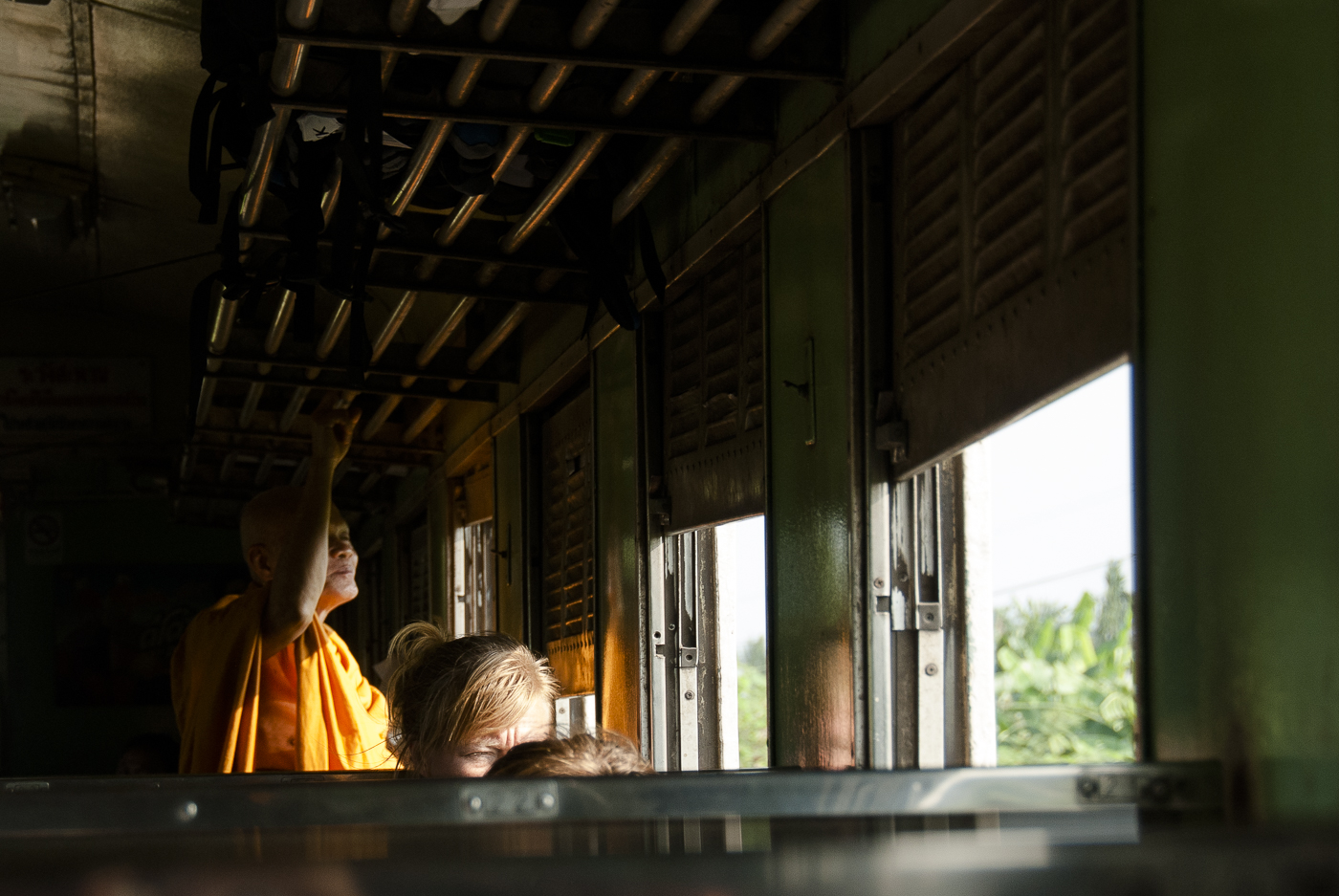 Kanchanaburi, Thailand monk on train