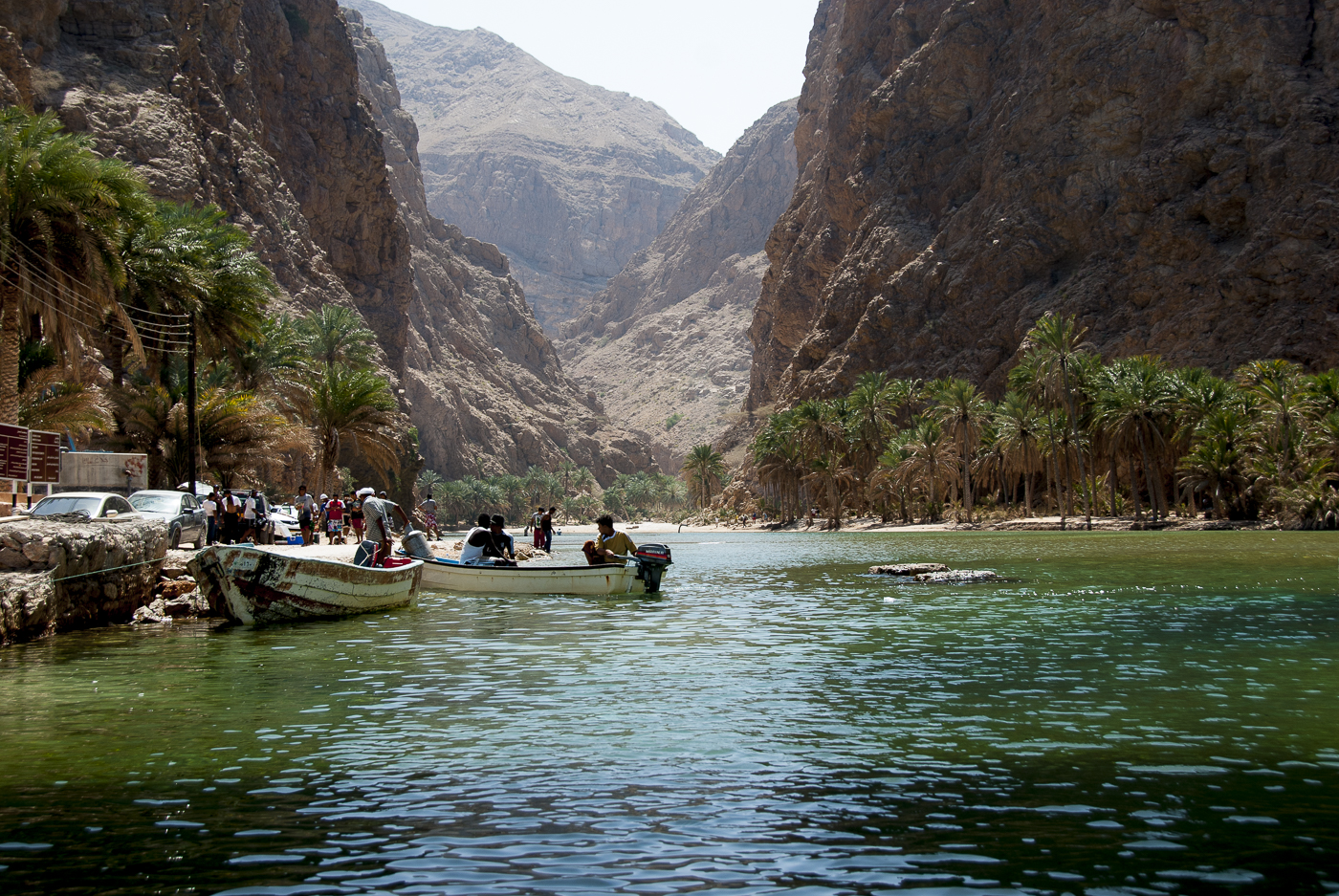 Wadi Shab, Oman waterway, boats, palm trees